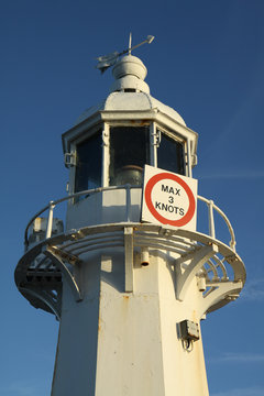 Lighthouse in evening light, Mevagissey, Cornwall, England