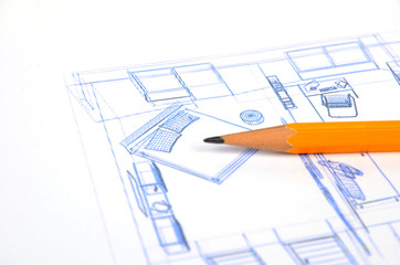 House blueprint and pencil