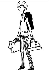 Side view of boy holding bag