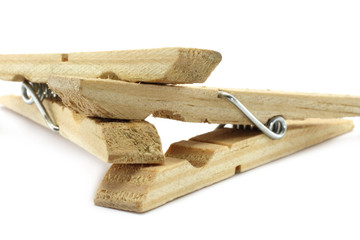 Two linked clothespins