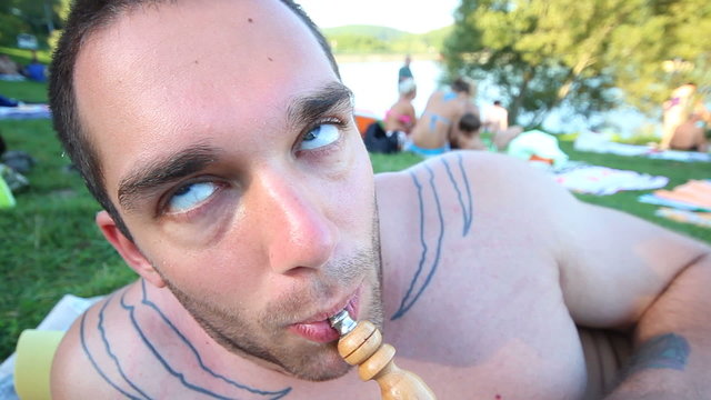 young man smoking sisha