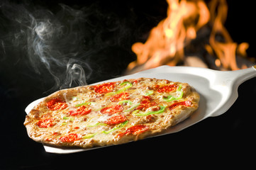 italian pizza baked in fire oven