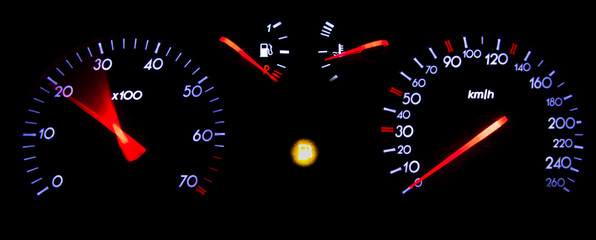 Tachometer with low fuel warning