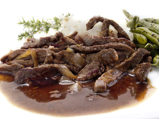 Zwiebelfleisch mit Reis und Bohnen