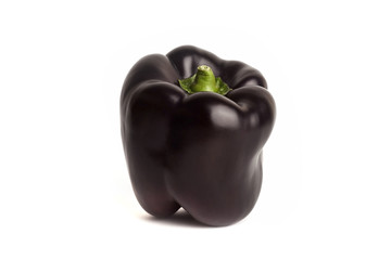 Black bell pepper isolated in white background