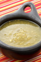tomatillo sauce in colombian clay dish