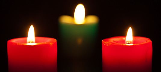 three candles burning
