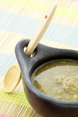 tomatillo sauce in colombian clay dish