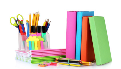 Fototapeta premium bright stationery and books isolated on white