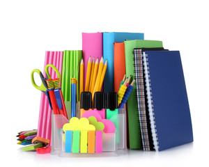 bright stationery and books isolated on white