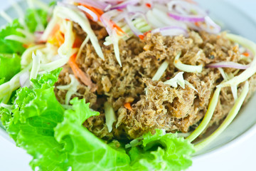 Deep fries crispy catfish with mango and onion salad