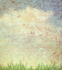 Grass and sky on paper texture background
