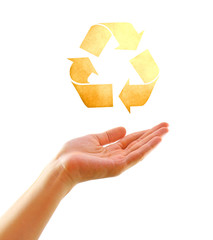 Eco concept : Hand with shape of recycle icon made by old paper