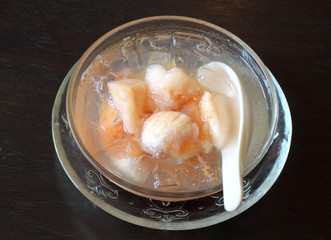 Chilled Santol in scented Syrup with spoon