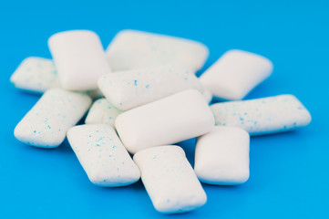 Chewing gums on blue
