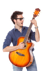 Funny Young Man Playing Guitar