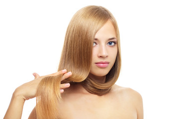 Pretty girl with long hair on white