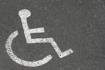 symbôle handicap parking