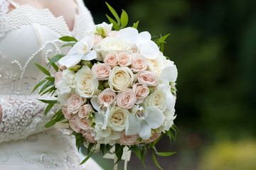 The bride with a wedding bouquet