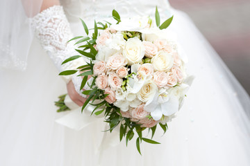 The bride with a wedding bouquet