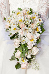 The bride with a wedding bouquet