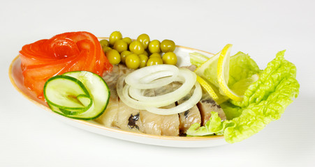 food series: macro picture of fillet herring with vegetables