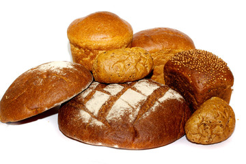 loafs of whole wheat and rye bread and isolated
