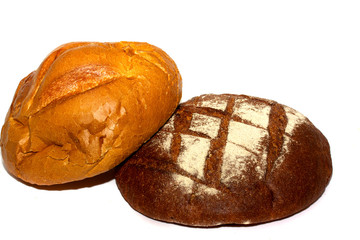 loafs of whole wheat and rye bread and isolated