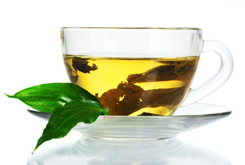 green tea in transparent cup and mint isolated on white