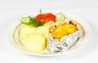 Baked Potato filled with meat and cheese on white plate