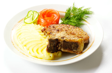 A mouth watering tenderloin steak with fresh vegetables