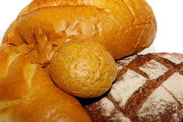 loafs of whole wheat and rye bread and isolated