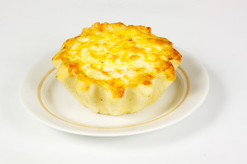 ndividual meat pie with potato topping.