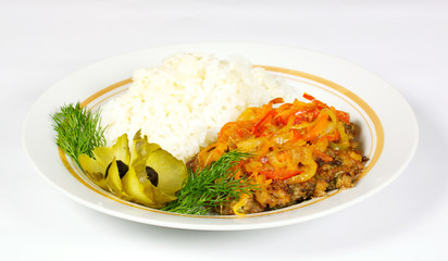 Fired meat, white rice and vegetables