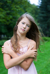 Young beautiful girl with fluttering hair