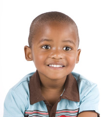 Adorable 3 year old black or African American boy smiling