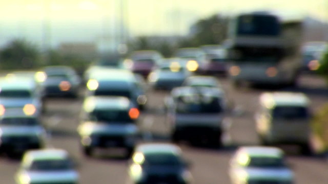 soft focus on highway filled with cars, timelapse