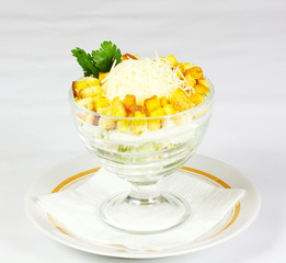 Caesar salad with cheese and croutons