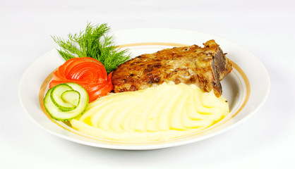 A mouth watering tenderloin steak with fresh vegetables