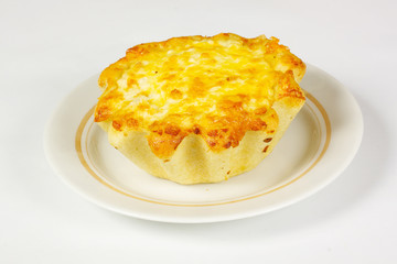 ndividual meat pie with potato topping.