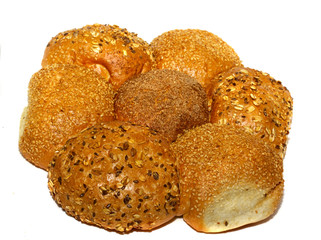 Loaf of bread and rolls isolated on white