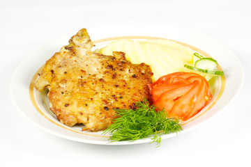 A mouth watering tenderloin steak with fresh vegetables