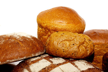 loafs of whole wheat and rye bread and isolated