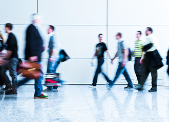 blurred trade fair visitors