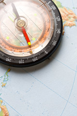 Compass on map background