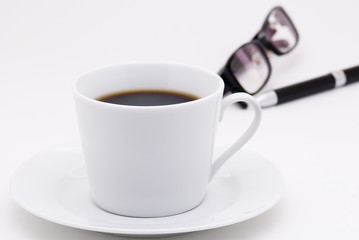 Coffee and pen