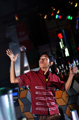 bartender doing acrobatic attraction