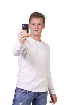 Businessman taking a picture with his phone
