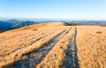 Morning autumn mountain road view.