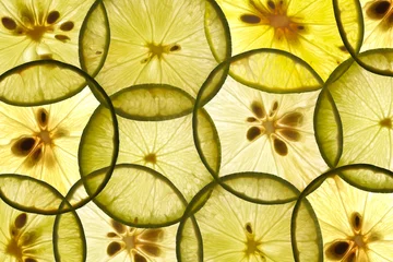 Fotobehang Stapel stukjes citroen © Sura Nualpradid